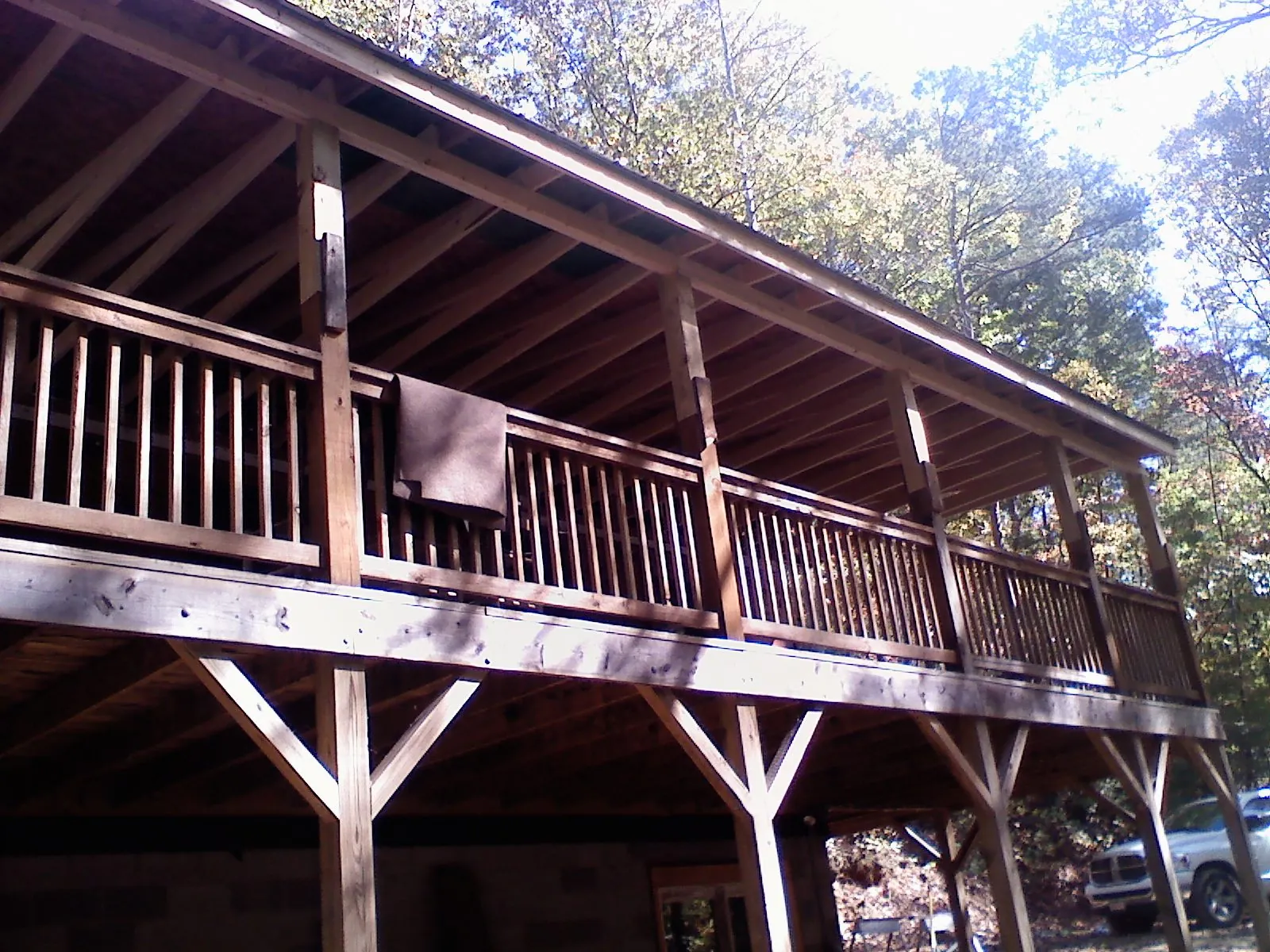 Timber framing under a new elevated porch and deck — Roof Leak Repair in Peekskill by Roofing Brothers